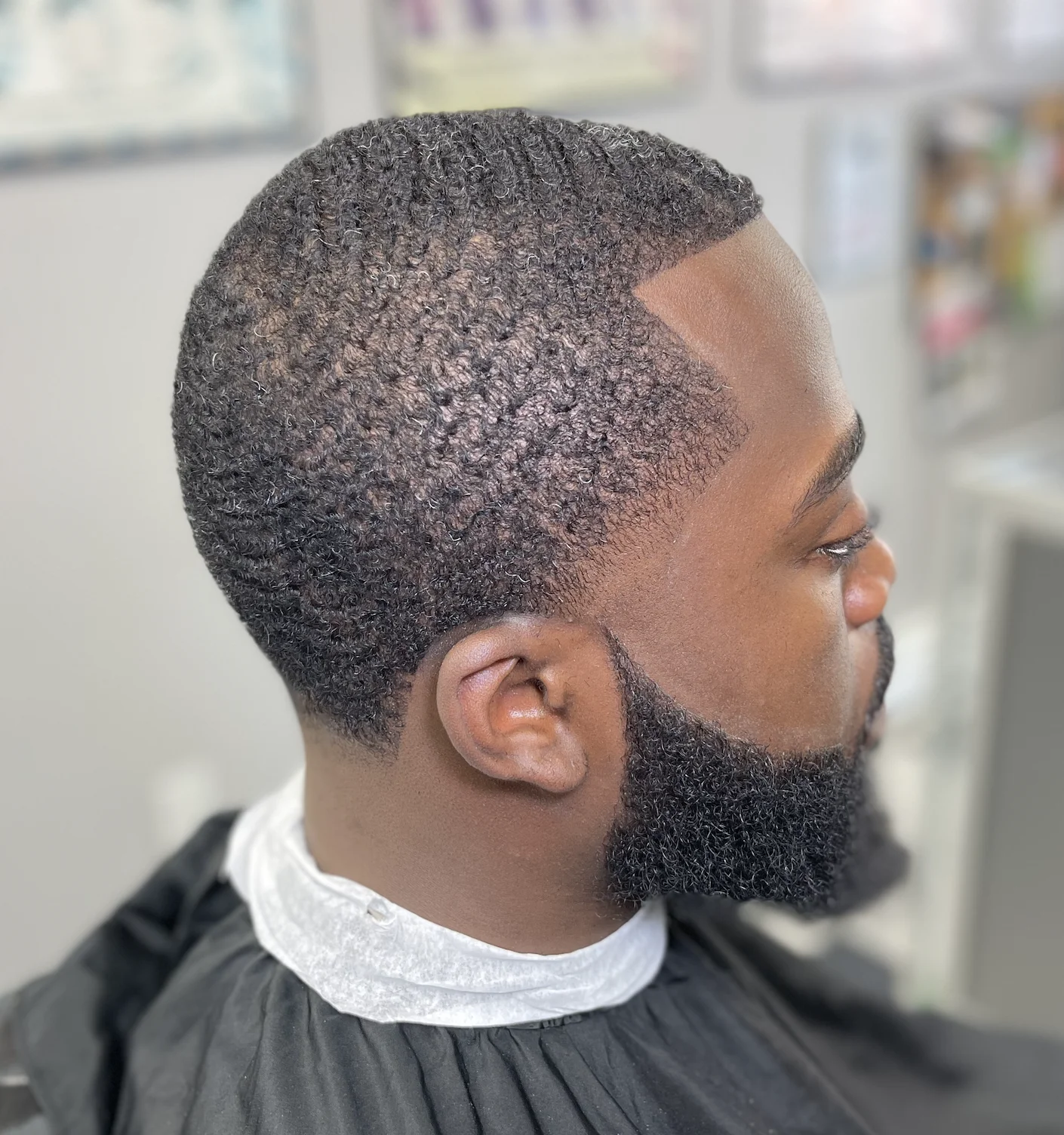 Clean taper haircut from The Kut Shoppe gallery